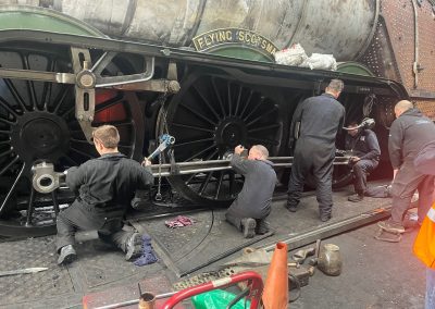 Professional technician or engineer worker fixing the metro train