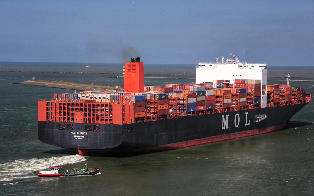 a large cargo ship sailing in the ocean
